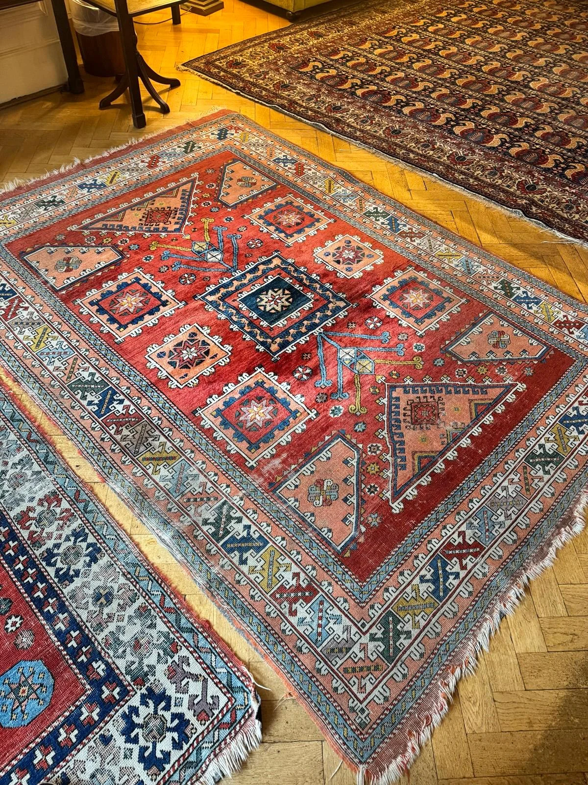 Traditional layered rugs in Oxford University room